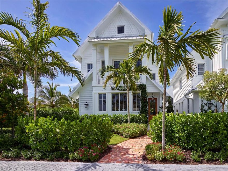 Leeside in Harbour Village - Absolutely in the heart of it all, within walking or biking distance to the Naples beaches and the Naples Pier, the shops, restaurant and lifestyle of Fifth Avenue S and Third Street S, and so much more, sits this captivating, cottage-style, new-construction home. Built to the finest standards, with a spaciously inviting first floor for quality living and entertaining.  The private pool courtyard and outdoor kitchen and gas grill, is accessed through impact glass sliding doors, creating an exquisite indoor-outdoor experience. Throughout this four-bedroom, two-story home, you’ll find the best of the best in materials and finishings, including marble countertops, wide-plank wood flooring, top-of-the-line appliances, custom cabinetry, in-ceiling speakers, and myriad design extras you have to see to appreciate. In the gourmet kitchen alone, find names such as Lacanche, Sub-Zero, Bosch, and Wolf. The second floor delivers three en-suite bedrooms and laundry room. Eminently welcoming while achieving a high level of elegance and sophistication, this is a home you can sink into, feel proud to show off, and create lasting memories in.