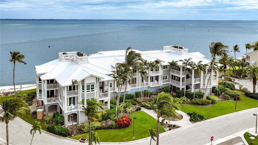Experience waterfront luxury at its finest in this stunning three-bedroom, three-bathroom condominium nestled within the prestigious South Seas Resort, Captiva Island's most exclusive waterfront destination. This meticulously renovated 1,405-square-foot haven feels more like an elegant home than a traditional condo, thanks to the visionary design work by renowned designer Aniko and master contractor Will Smith, who elevated the space with top-of-the-line finishes throughout. Step inside to discover exquisite craftsmanship where panoramic views of Pine Island Sound create a backdrop that rivals the world's finest luxury yachts. The northeastern tip of the island location offers unparalleled privacy while providing spectacular colorful sunrise views over the Sound and breathtaking sunsets over the Gulf of Mexico. From your windows, witness dolphins and manatees playing directly in the pristine waters below—a wildlife lover's dream come true. The Seabreeze Villa's unique eight-unit design includes covered parking for both vehicles and golf carts, plus generous interior and exterior storage options. Choose to participate in the exclusive Club Captiva membership to unlock access to South Seas' world-class amenities, seaside dining venues, Captiva Landing, Bayview pools, upcoming spa services, and the coveted opportunity to lease dock space at South Seas Yacht Harbour for vessels up to 100 feet on daily, monthly, or annual terms. This premium location overlooks The Clutch Golf Course, offering stunning fairway vistas, while the legendary Redfish Pass provides exceptional sportfishing opportunities just moments away. The property provides effortless access to the enchanting upper islands within minutes, positioning you at the heart of Southwest Florida's most sought-after boating and fishing paradise. Whether you're seeking a primary residence, vacation retreat, or lucrative investment opportunity through the established Homes of Distinction Rental Program, this property delivers exceptional returns on every front. The rare combination of resort-style luxury amenities, pristine natural surroundings, and sophisticated living spaces creates an unmatched island lifestyle where extraordinary moments unfold daily in your own private paradise.