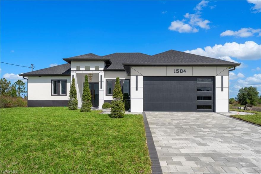 Stunning new construction completed in 2026, situated on an oversized 0.5-acre lot (209 x 104). This property was thoughtfully built with high-quality materials and detailed finishes throughout, offering both functionality and modern design.
The home features an open-concept layout with tile flooring throughout, enhanced by custom ceiling designs and linear A/C vents that add a clean, contemporary look. The kitchen is fully equipped with built-in oven and microwave, cooktop, dishwasher, and custom cabinetry extending to the ceiling, providing both style and ample storage.
The primary suite offers a spacious retreat with two walk-in closets featuring built-in cabinetry and a spa-style bathroom with marble-like wall finishes, LED mirrors, modern fixtures, and an upgraded toilet. All bedrooms include custom-built closets, and the office/den includes a closet, making it suitable as an additional bedroom.
Designed for convenience and entertaining, the property includes a fully built outdoor kitchen and an exterior half bathroom. Additional features include:
Impact-resistant windows and doors
Paver driveway
Sprinkler system covering the entire property
Professional landscaping
Laundry room with washer, dryer, and utility sink
Reverse osmosis system and water filtration
Decorative lighting and upgraded fixtures throughout
Modern garage door with design elements
This home offers a combination of space, quality construction, and thoughtful upgrades, ideal for both everyday living and entertaining.
Enjoy seamless indoor-outdoor living with a backyard patio featuring a fully installed outdoor kitchen and direct bathroom access. Additional highlights include a laundry room with washer, dryer, and utility tub, a luminous garage door with crystal inserts, and expansive windows that flood the home with natural light.