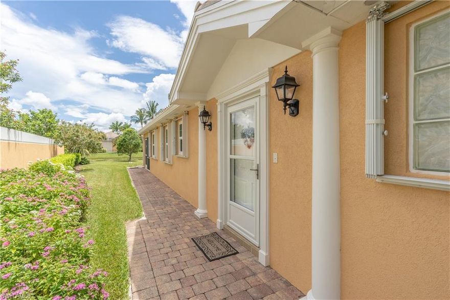 Best deal in Veronawalk. Open and inviting best describes this semi furnished, two bedrooms with den/ two bath attached Capri villa located on a quiet lane in the gated community of VeronaWalk.  This open concept home offers two separate carpeted, bedroom suites great for privacy when having overnight guests.  Bright white tile flooring is in the living areas. The kitchen has quartz counters, a deep basin sink and stainless/slate appliances . Both baths have new mirrors, quartz top vanities and comfort height toilets.
Upgrades are plentiful.  The exterior has been recently painted. Windows have impact resistant glass and accordion shutters enclose the lanai. The front door and storm door is also hurricane ready.  A portable generator hook up has been installed.  The garage has an epoxy flooring, overhead storage area and a screen that can be lowered so you can leave the garage door open for ventilation. New fans, dining chandelier and smoke alarms have also been updated.
From the rear bank of glass sliders is a covered screen lanai.  From here you step onto your deep grassy expanse.  Your private yard with six foot walls on each side opens to a view of a tranquil waterway.