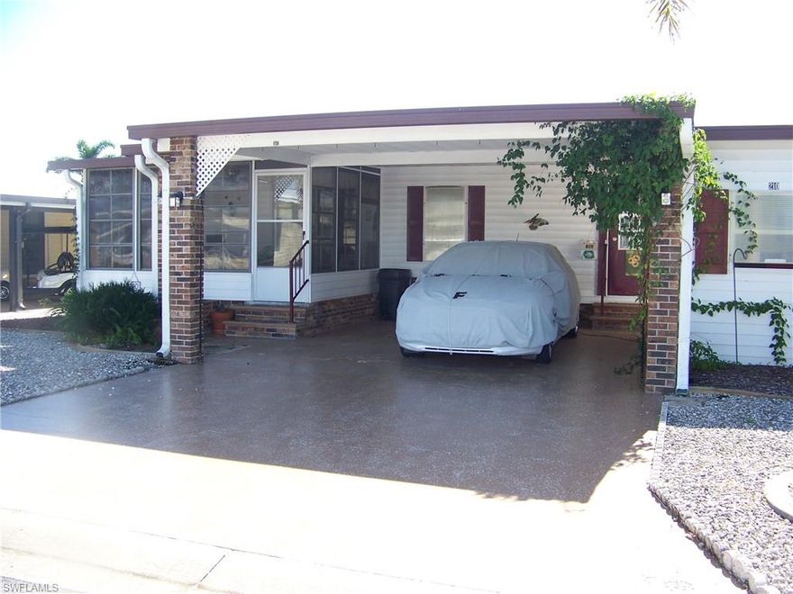 REDUCED FOR QUICK SALE!!! IMAGINE PURCHASING A PIECE OF PARADISE IN BURNT STORE COLONY WITH THE LAND SHARE INCLUDED FOR THIS AFFORDABLE PRICE!!!Come take a look at this adorable, well-maintained home nestled in Beautiful Burnt Store colony! This Gated & over 55 community is rated up there with the BEST of the BEST! Make an appointment to day to see this little "gem" before it is long gone! It is located within walking distance to all the wonderful amenities the park has to offer! The home comes with the land share in the asking price, valued at $32,000 along with furniture and turn-key items. As you enter, there is a quaint, fully applianced kitchen with raised cabinets/drawers, double stainless-steel sinks with window, tile backsplash & an updated laminate wood-like floor that extends through a good portion of the home. The dining/living room combo has sliders that open up to a convenient tiled, all-weather lanai waiting for you and your guests to enjoy your morning coffee, breakfast, or that evening glass of wine! The 2 bedrooms are split with guest bath located between the two and the Master having its own bath. Both have ample closet space and corner windows. The hallway between the 2 bedrooms has a large closet and a large "niche" that has a full-sized desk in place. Both baths have single vanities & shower or tub/combo. The roof is metal, and A/C is brand new August 2025, front door has retractable screen door, windows are double hung, walls are textured, hurricane shutters are drop down and very easy, there are downspouts & gutters, concrete curbed gardens, brick trim & gravel landscaping for EASY maintenance. There is a small patio in the backyard for enjoying a bit of that Florida sunshine, washer/dryer are conveniently located steps away from the front door in the shed & parking is a breeze with this side-by-side carport (has extra hurricane tie downs). This little piece of paradise is waiting for you, come check it out!!!!!