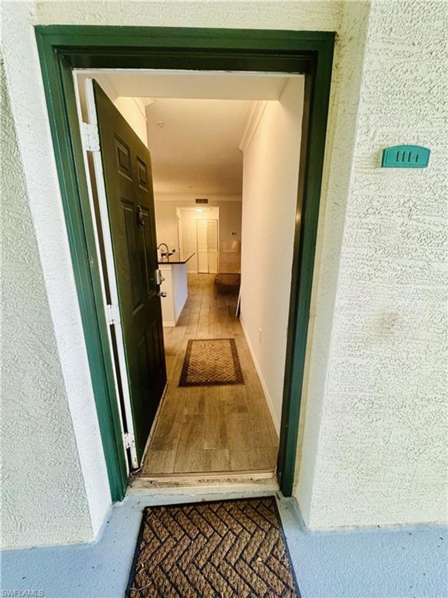 AVAILABLE MARCH 1, 2026! Highly-desirable FIRST floor, two bedroom, two bathroom split bedroom floor plan condo.. now available as an ANNUAL rental in Royal Greens at Gateway! This condo has been maintained meticulously, overlooks the beautiful lake and nature preserve to the west. Lots of wildlife to observe from your patio, and let's not forget about the SWFL sunsets you will see every night!! This lovely updated unit boasts granite countertops throughout, NO CARPET (tile and laminate throughout), newer appliances, a huge master WALK-IN SHOWER making it extra safe and accessible, double walk-in closets, and convenient electronic keypad entry. Living at Royal Greens at Gateway, you’re walking distance from dining, shopping, and entertainment! Royal Greens is a gated community, known for its peaceful atmosphere and well maintained grounds. Amenities include a community pool, fitness center, indoor basketball court/recreation room, business center with WIFI, and plenty of walking/biking paths. Call today to schedule a showing, and make this annual rental your own slice of paradise!