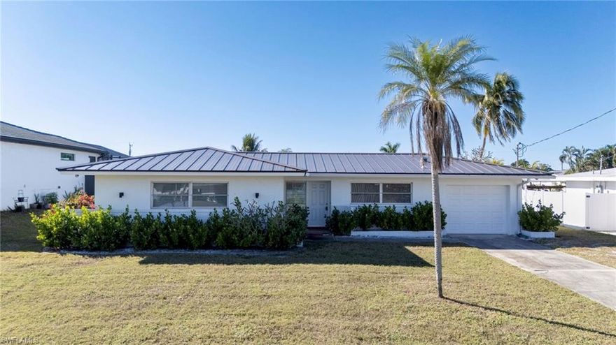 Welcome to this newly renovated gulf access home in the Yacht Club! The home features beautifully remodeled bathrooms and kitchen, as well as a new metal roof installed in 2023! The kitchen opens to the great room and allows you to look out to your gulf access canal. Located just minutes from the Yacht Club beach, dining, and downtown, this home is move-in ready and priced to move fast!