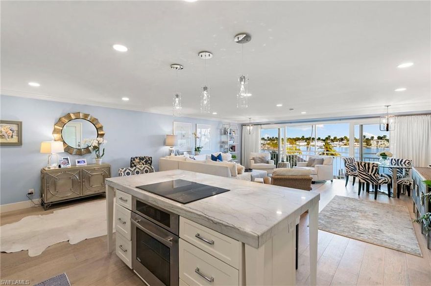 Bay and Gulf views from this rarely available updated three-bedroom condo south of Harbor Drive. Open floor plan with spacious views of the bay from the living room and kitchen. Sunset views from the master bedroom balcony on the other end.  This floor plan with more square footage has never been available on the MLS as it usually sells to current residents before it hits the market. Gulf Bay Apartments is a very well-maintained association. Boat slips are available with direct access to the Gulf. Beautiful saltwater pool with flowering landscape on the Bay, tiki hut, grill area outdoor bar area, with kayak and paddle board storage. Quiet part of Gulf Shore Boulevard as drive dead ends into Doctor’s pass.  Beach access right across the street.  Wood flooring, impact windows, low fees, small friendly community, pet friendly.