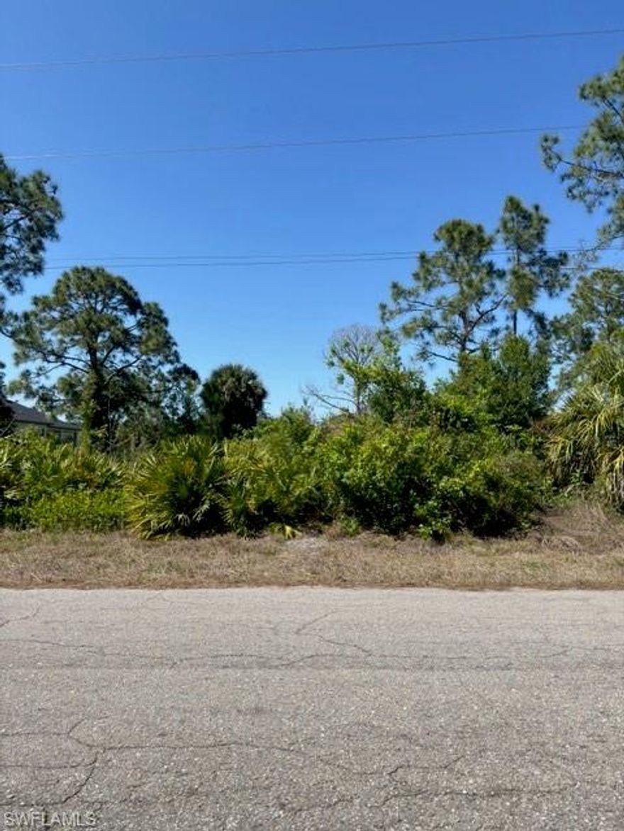This residential lot is located along a paved road and surrounded by existing homes, offering a great balance of privacy and accessibility. The property is just a short drive to shopping, dining, schools, and everyday conveniences. Ideal for a custom home or future investment in a growing area with nearby development. A prime location for those seeking space, convenience, and long-term potential.