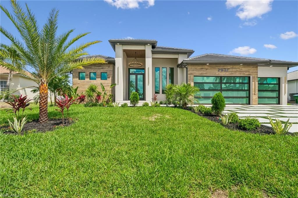 Photo of 2931 SW 30th ST, CAPE CORAL, FL 33914 (MLS # 226020503)