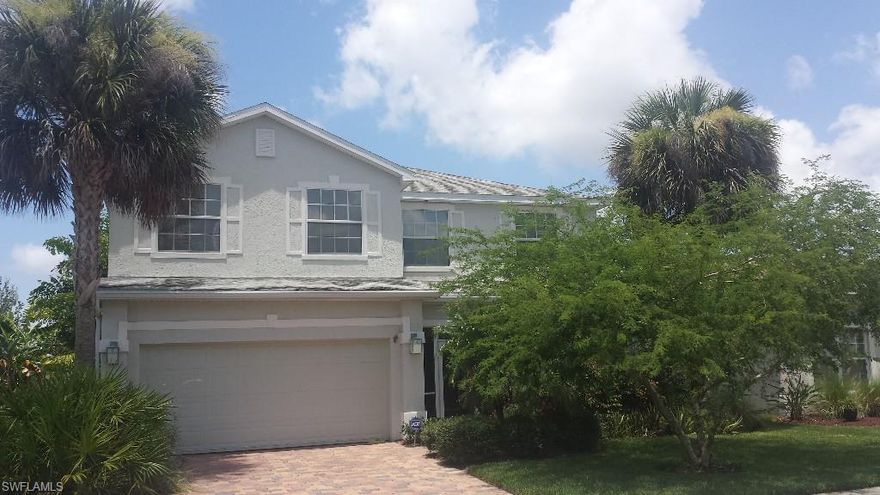 Spacious 3 Bedroom 2.5 Bath Lakefront home with upstairs loft.  Loaded with tons of upgrades!! Master suite features a sitting area, walk-in closet with custom cabinets, Master bath with dual sinks & soaking tub. Formal Living room and Dining Room. Family room is open to the kitchen, with 2 sets of french doors leading to the 2 story lanai filled with tropical plants, overlooking the lake. Storm Shutters, sprinklers, central vac. pre wired for whole house surround sound. Minutes to Beaches, Healthpark Complex, Restaurants & Shopping.