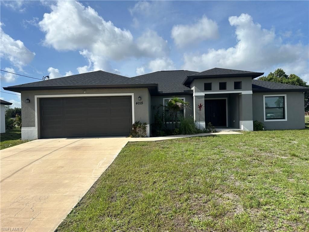 Photo of 4015 6th ST W, LEHIGH ACRES, FL 33971 (MLS # 226019581)