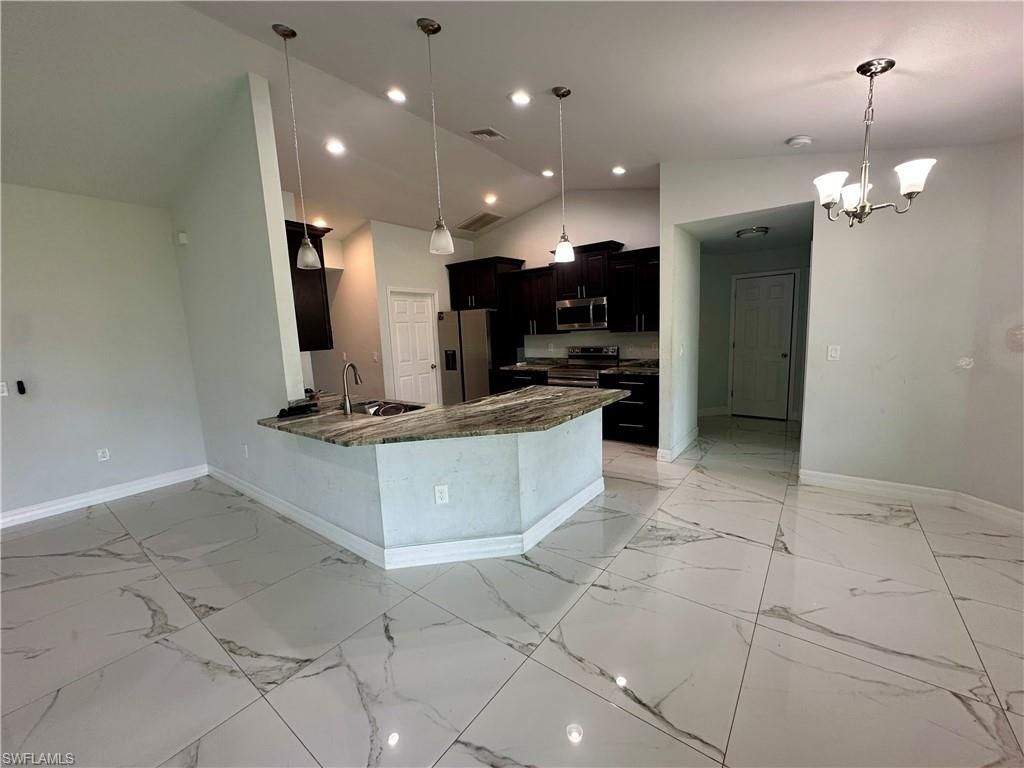 Photo of 4015 6th ST W, LEHIGH ACRES, FL 33971 (MLS # 226019581)