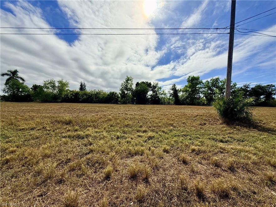 This beautiful lot offers a unique opportunity to build the home of your dreams, Situated in Cape Coral a growing community, with Canal Access, this land boasts panoramic views and in a convenient location close to local amenities. With ample space to design and build, this lot is perfect for those looking to create their own personal paradise. Enjoy your backyard with beautiful sunsets. Don't miss the chance to turn this land into your HOME!!