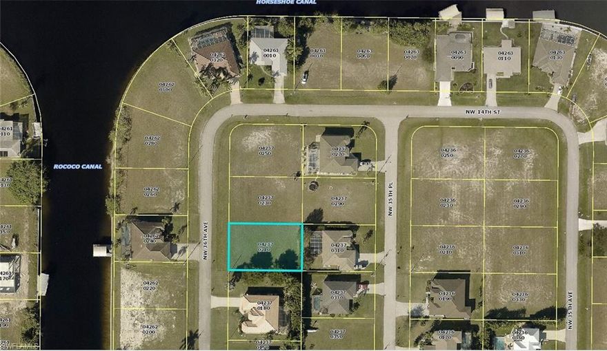 Ready to build your new dream home? Check out this off water lot located in up and coming Gulf access Unit 60...with an added bonus of newer homes all nearby (see photos)!!  Located directly across the street from homesites on the 120' wide Gulf access Rococco Canal.