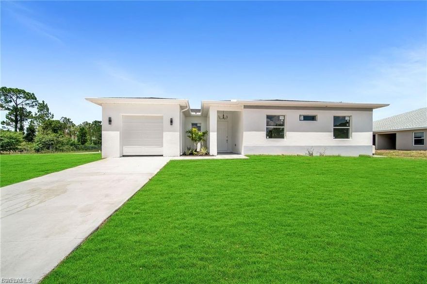 Gorgeous 3-Bedroom Home with Hurricane Impact Windows Located in a well-established Lehigh Acres neighborhood near shopping and schools, this upgraded 3-bedroom, 2-bath, 1-car garage home features porcelain tile throughout. The modern kitchen offers sparkling white quartz countertops, soft-close Shaker cabinets, and top-brand stainless steel appliances. The master bedroom includes custom wood closet interiors. Washer and dryer are included, and the home is fully equipped with hurricane impact windows and sliding doors.