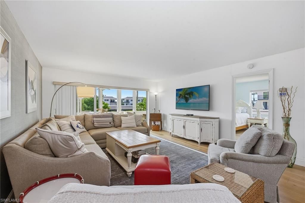 Photo of 3410 Gulf Shore BLVD N #203, NAPLES, FL 34103 (MLS # 226019579)