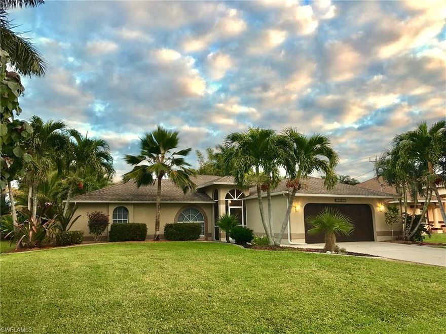 Location, Location, Located, this beautiful 3 bedroom 2 bath open concept floor plan pool home is located in desirable SW Cape Coral across from water front properties. Granite counter tops, wood cabinets, tile and wood floors. Features  include a heated  30 x 13 sports pool with LED lighting, sun deck and full length bench.   Enjoy the outdoor paradise -pavered screened  lanai area great for entertaining.  Pool cage screen is 20 x 20 mesh designed to keep out tiny insects like no-see-ums. Pocket sliders allow easy access to the lanai from the master bed room, living room and dinning room . The outside features lots of exotic and tropical tree's and plants, making your back yard feel like a private oasis,  and much more. City water and sewer, all Assessments in and paid.