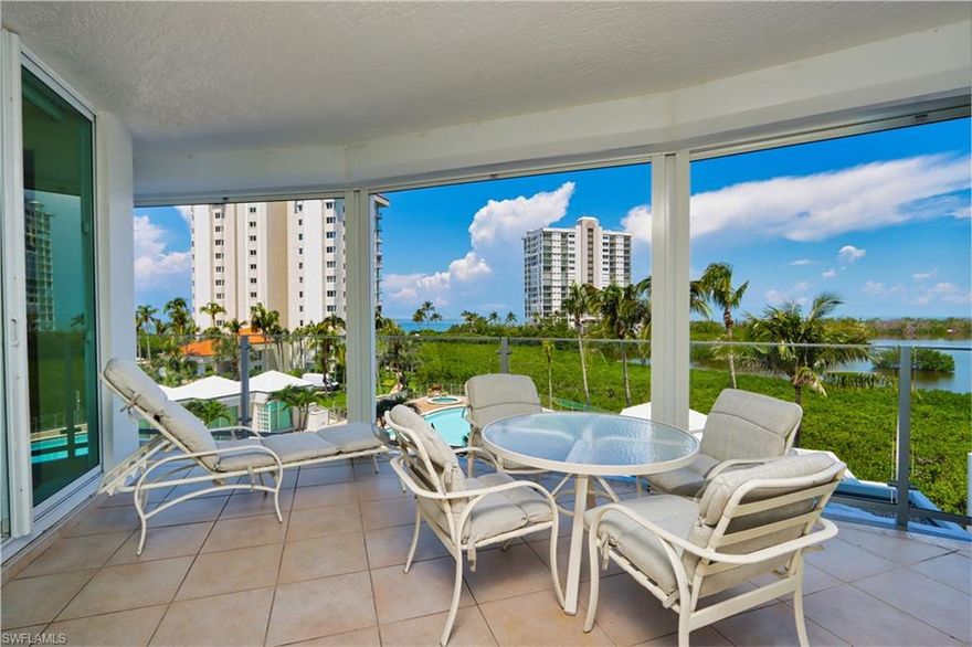 Luxurious high-rise building in Baypointe at Naples Cay! 
This is a gorgeous 4th floor residence with panoramic views over Clam Bay, Pelican Bay and the Gulf of Mexico with its beautiful beaches! Enjoy peace & serenity from your patio while watching the boating activity or the many birds that make the protected mangroves their home. Privacy abounds in this guard gated community with secure entry features at the building and gated garage parking under the building. Just steps from the beach for a day of sunning, shelling, reading or taking a walk along the miles of white sand beaches & aquamarine blue water along its edges. 
Other Baypointe amenities include a large heated pool & spa, fitness room, conference room, billiards room, a social room with full kitchen and guest suites. This home offers 2 full bedrooms, a Den, 3 baths and with 2173 sq. feet of living space, plenty of room for your family & guests to visit. Lovely furnishings in light colored fabrics with wood accents. Tile flooring in the living areas, carpeting in the bedrooms, and spectacular views from each spacious bedroom. The Naples Cay community is centrally located to all that Naples has to offer including the Waterside Shops & Venetian Village for shopping & dining, Artis-Philharmonic Performing Arts Center, or Mercato, 5th Avenue & 3rd Street South for downtown strolling and many more upscale restaurants & shops to experience.   90 day minimum