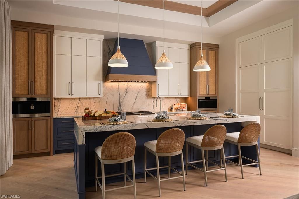 Photo of 405 Putter Point DR, NAPLES, FL 34103 (MLS # 225085028)