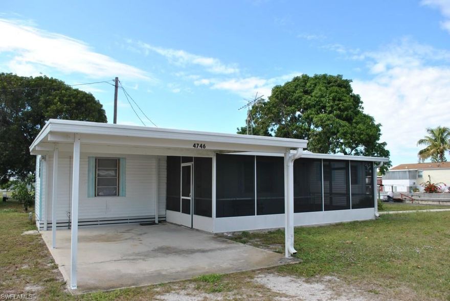 One of the least expensive homes on a canal in St. James City! Excellent Rental History. Waterfront with shared 10' easement on one side. Very good neighbors! One bedroom, one bath in Flamingo Bay with plenty of room. Perfect fishing getaway or live in year round. Vintage 1965 furnished, turnkey home. Oversize lot, newer seawall. Large screened lanai, plenty of storage. Quick gulf access. Room to park a motor home! Voluntary homeowners association of $125 per year for boat launch privileges, clubhouse and pool. The neighbors raved that the Mango tree is one of the best producing, with some of the best tasting fruit on Pine Island. Come live the island life!