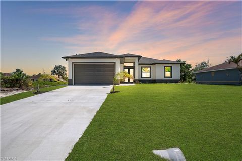 Photo of 2615 45th ST SW, LEHIGH ACRES, FL 33976 (MLS # 226016151)