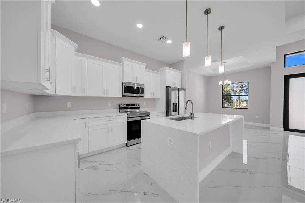 Photo of 2615 45th ST SW, LEHIGH ACRES, FL 33976 (MLS # 226016151)