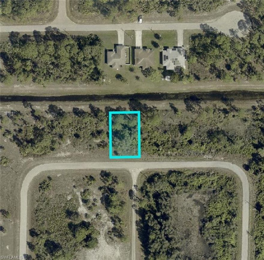 Great investment lot in Lehigh Acres! Residential parcel on a quiet street with east-facing rear exposure, surrounded by newer homes in a fast-growing area. Ideal for builders or investors looking to build or hold for future appreciation. Convenient location near shopping, schools, and major roads.