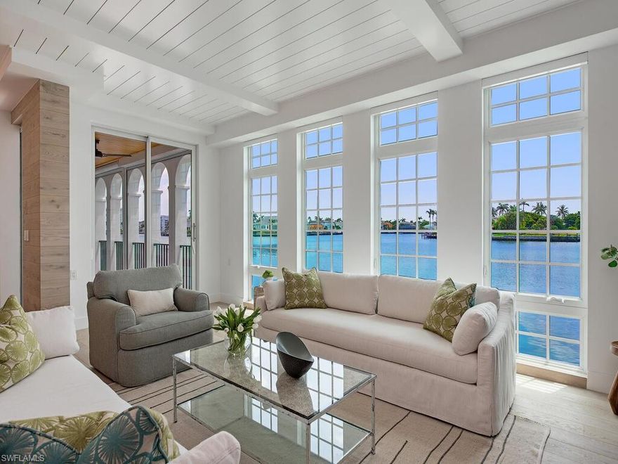 Totally updated, thoughtfully reinvented floorplan in this first floor three-bedroom, 3 ensuite bath condo at iconic Venetian Villas.  Gutted from top to bottom, with impact windows, Legno Bastone white oak floors, Wolf/SubZero appliances, new kitchen and bath cabinetry, countertops and fixtures, new doors, hardware, air conditioning, hot water heater, plumbing, electric and laundry.  Expanded waterfront windows in the great room from almost floor to ceiling.  Shiplap galore.  Has to be seen to be appreciated.  Never before has a Venetian Villa been created in this oh-so-current style.  Boat slips available to owners; private beach access; walkable to Venetian Villas.  The very best of Naples.