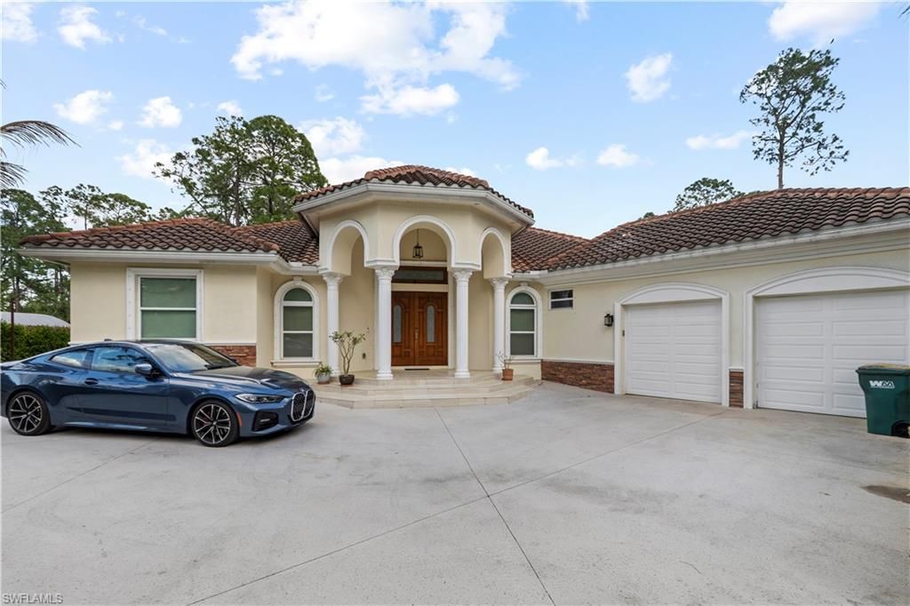 Photo of 2480 16th ST NE, NAPLES, FL 34120 (MLS # 226009765)