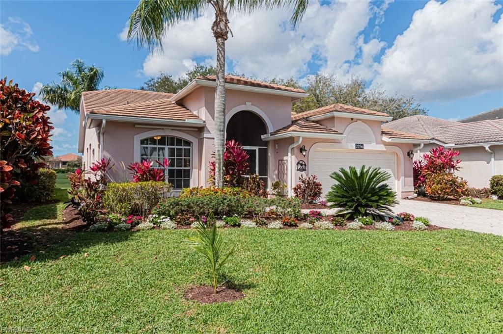Photo of 2256 Heritage Greens DR, NAPLES, FL 34119 (MLS # 226009122)