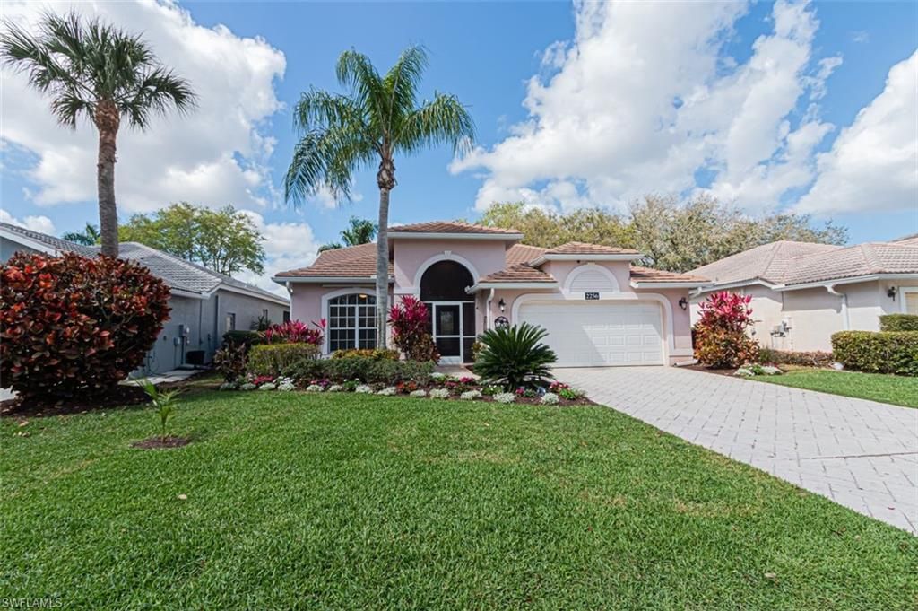 Photo of 2256 Heritage Greens DR, NAPLES, FL 34119 (MLS # 226009122)