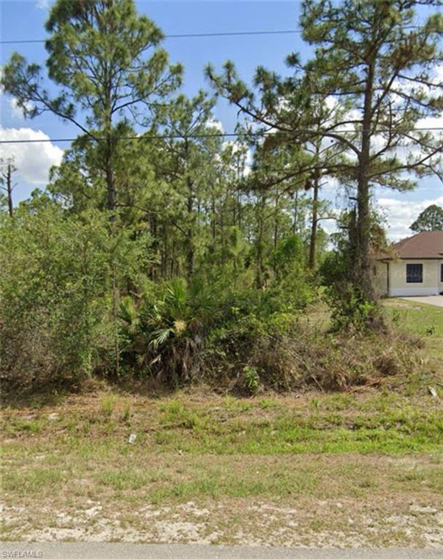 Upland lot, 1.59 acres. Here's your chance to build your Naples. Bring your  horses, quad-runners and all your toys along with your blueprints and build something special. Centrally located in the Estates, a quick trip on major roads into all that Naples has to offer: Restaurants, beaches, shopping, and entertainment. Upland is ideal for home building.