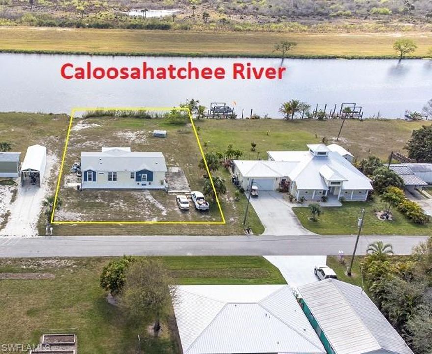 Seasonal or long-term rental available on the Caloosahatchee River (Intracoastal Waterway). Discover this inviting waterfront residence located in the Turkey Creek boating community of Ortona. This well-appointed single-family home features 2 bedrooms, 2 bathrooms, a versatile den, and a bright, open layout ideal for both everyday living and entertaining. Interior finishes include a combination of vinyl and carpet flooring, creating a comfortable and welcoming atmosphere throughout. The rear deck overlooks the water, offering scenic views and a generous space for outdoor lounging or gatherings. Set on approximately 0.50 acres, the property provides ample room for outdoor enjoyment and taking full advantage of Florida’s year-round sunshine. Ideal for boating enthusiasts or anyone seeking a peaceful waterfront setting, this home offers a unique opportunity to enjoy the relaxed lifestyle of the Turkey Creek community. Schedule your private showing today to experience all this property has to offer.