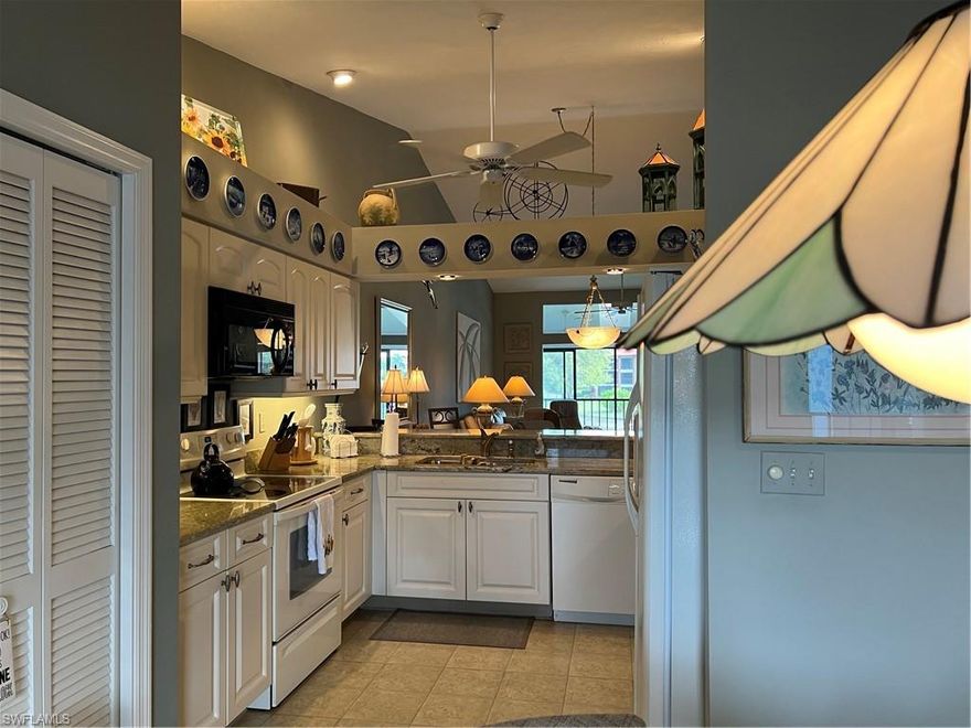 This is the home you've been waiting for.  Second floor veranda with full golf membership and a superior view of the golf course and the lake  at Countryside Golf and Country Club.  This exquisite home boasts two glassed in lanais, a totally remodeled open kitchen with vinyl flooring, two fully remodeled bathrooms and carpeting throughout the living room and the two bedrooms.  The pool is right out your front door with a covered meeting area and a separate place to barbeque and meet friends and neighbors. This home is sold turnkey and is ready to move right in!!
        There is something for everyone at Countryside.  A two year old renovated golf course, a fully equipped fitness center with full time attendant and instructor,  a full restaurant, bar, games, concerts, karaoke, Binga, mah jong, group trips to fishing, cultural/sporting and events, poker, canasta, neighborhood gatherings and too many more activities to mention.  Shopping, highways and the Gulf of Mexico are all within minutes.
     The club is in the process of voting to enhance/ expand the existing clubhouse and to add a newly designed resort pool with casual dining and outdoor bar.  Results will be known 4/8/2022