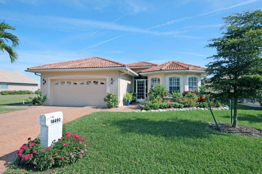 -Exquisite 3 bedroom 2 bathroom residence located in the desirable Iona Area. The entire property around this ground level home has been flawlessly landscaped with beautiful gardens, brick patio leading to a private dock. The home itself is stunning with an expansive lake/canal view.  Great windows providing remarkable natural light, open floor plan, elevated ceilings and spacious living and kitchen area. Master bedroom with French doors leading to bricked enclosed Florida room. Roomy master bath with large shower, garden tub and double sink vanity. New updates include electric hurricane shutters, plantation shutters, elevated commodes, french doors, appliances, brick patio, steps to dock & paint. Interior laundry room and 2 car garage. Boating River access from home via forklift. Waters Edge Estates is a gated community within Peppertree Pointe providing manicured grounds, marina, fishing pier, riverside beach, picnic area, jogging path, boat slips, boat ramp, community pool & tennis.