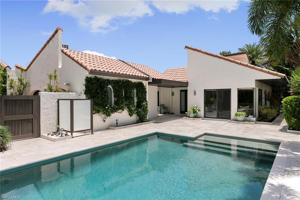 Photo of 580 Tierra Mar LN #21, NAPLES, FL 34108 (MLS # 225068339)