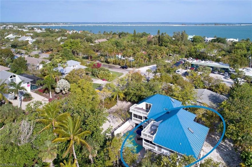 Totally cute near beach home and PRICED to sell. Home is adjacent to Historic East End just 1/2 mile to the Sanibel Lighthouse and Fishing Pier. New metal roof, updated kitchen, lattice, upgraded Master Bath, new hot water heater and recent HVAC are just some of the reasons you'll love this Beach House. Recent interior paint. Beautiful pool and surrounding deck to entertain family and guests. Home comes furnished with artwork exclusions.