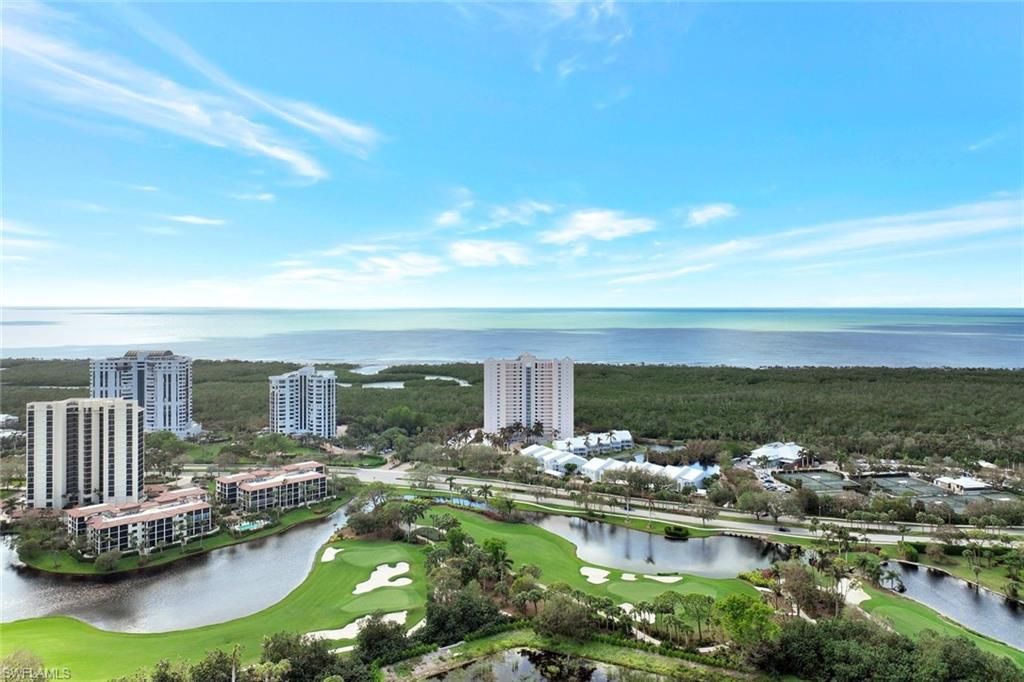 Photo of 6101 Pelican Bay BLVD #201, NAPLES, FL 34108 (MLS # 225072240)