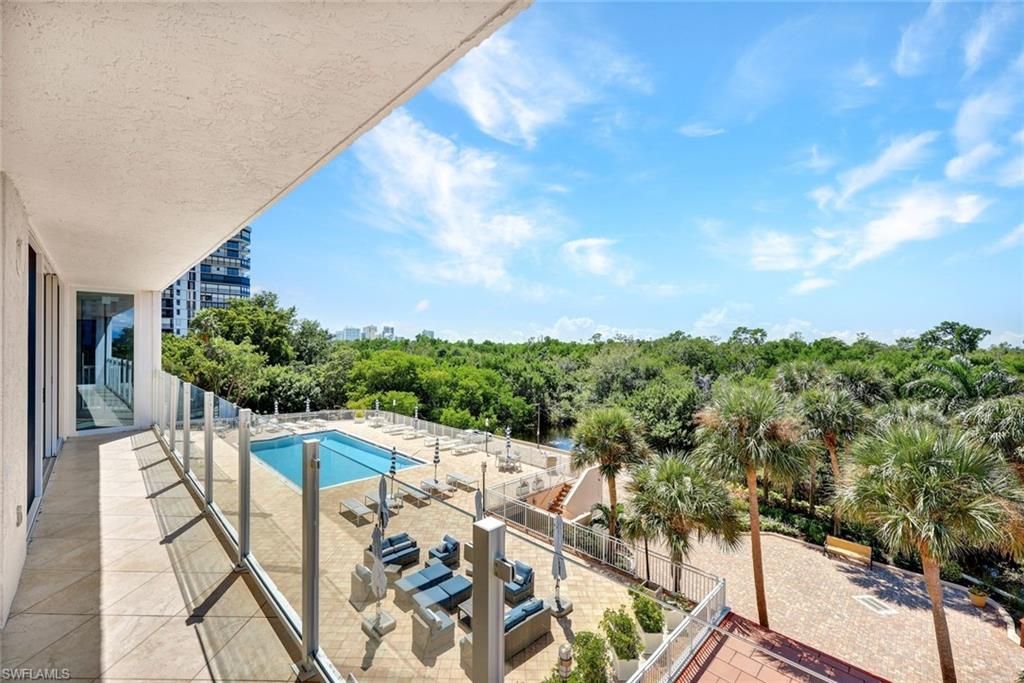 Photo of 6101 Pelican Bay BLVD #201, NAPLES, FL 34108 (MLS # 225072240)