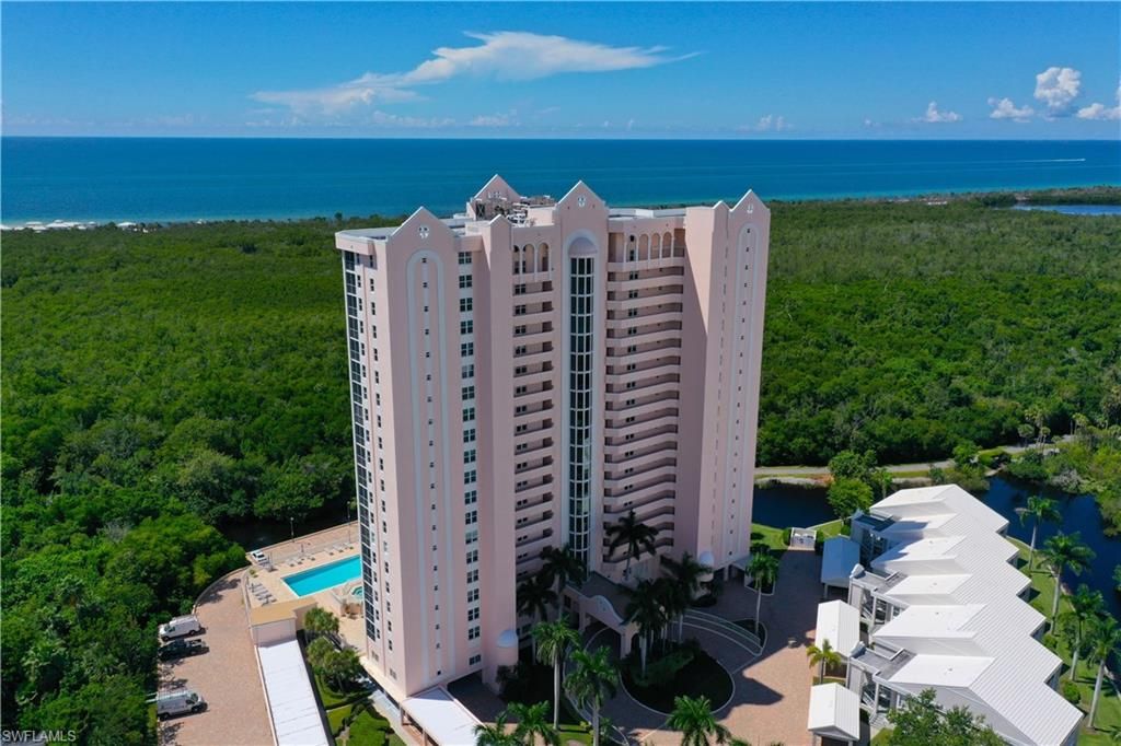 Photo of 6101 Pelican Bay BLVD #201, NAPLES, FL 34108 (MLS # 225072240)