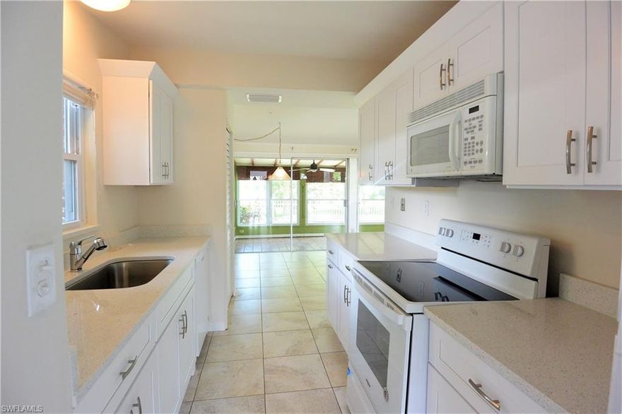 Consider the location, condition, upgrades, and price per sq ft. and see why we think this is one of the best deals currently on the market in all of Brookside. Brand new kitchen with soft close white shaker wood cabinetry. New range. New quartz countertops, sink and faucet. Entire interior has been professionally painted. 18x18 tile throughout so no carpets to continually clean or replace. Master bedroom has sliders to lanai with large walk-in closet. Tastefully updated master bathroom with tub/shower combo.  Separate utility room with lots of extra storage space. Huge Florida room with Southern Exposure for entertaining. A/C was replaced in 2015. Well maintained fenced in back yard. Minutes to downtown Naples and 5th Ave, or bike to the beach. If you're looking for a great home, close to downtown, consider all this home offers compared to the rest, then make an appointment to see what a real deal looks like in Naples Florida.