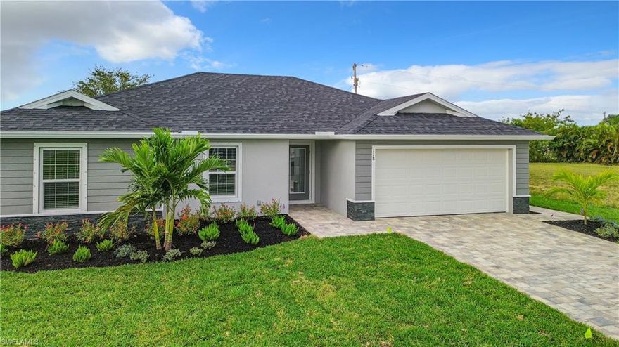 LOOKING FOR A BEAUTIFUL NEW CONSTRUCTION HOME IN CAPE CORAL WITHOUT THE LONG WAIT? Come see this beautiful 4-bedroom, 2-bathroom residence before it's too late! Upon entering, you'll immediately notice the meticulous attention to detail. The heart of the home is the great room, which is flooded with natural light and glass sliders that lead to the 10x16 under-truss lanai area. The kitchen has ample cabinet space, stainless steel appliances, Quartz counter tops and a breakfast bar. The master bedroom has an ensuite bathroom that includes dual sinks and a spacious shower. The three additional bedrooms share a guest bathroom with dual sinks and a tub/shower combo. Garage epoxy flooring. The exterior of the home will include paver driveway & walkways along with St Augustine sod! Cape Coral is nicknamed the “Venice of America, navigable waterways with 400 miles of canals provide access to an impressive array of outdoor recreation opportunities, which, along with the city’s proximity to several beautiful beaches and parks. FULL BUILDERS WARRANTY INCLUDED! You will also be able to speak DIRECTLY to the builder! INCENTIVES AVAILABLE! OVERSIZED LOT! EST COMPLETION BEFORE END OF YEAR!