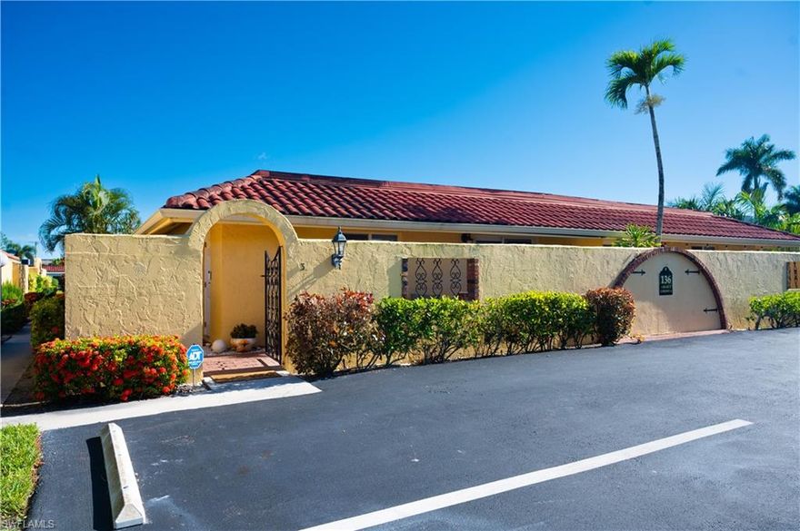 Say hello to this fully turnkey 2-bedroom, 2-bathroom Spanish-style villa with all the updates you’ve been hoping for. Inside, you’ll find a fully renovated kitchen with soft-close wood cabinets  plus new electrical, new plumbing, fresh paint, updated vanities, and stylish vinyl flooring throughout. This villa offers exceptional storage—with two outdoor spaces for your golf clubs, beach chairs, and bikes, an oversized walk-in closet, and three additional linen-style closets to keep everything organized and out of sight. Comfort comes easy with ceiling fans in every room, a smart thermostat, keypad entry, and an ADT security system. Step outside to the wrap-around lanai, a private retreat perfect for lounging, entertaining, or simply enjoying the breeze. This unit is steps away from the 19th Hole Restaurant (dine in or carry out), golf shop and main pool area. In the Glades, you’ll have access to two walkable golf courses for exercise, or you can ride for fun (par 55 and par 70), along with pickleball, tennis, bocce, shuffleboard, and 10 community pools. A cozy library, art classes, bingo, dinner dances, cards, karaoke, and more; The maintenance fees cover golf green fees, water, sewer, trash, WIFI, cable, pest control, and more. Plus, you’re minutes to shopping, restaurants, downtown 5th Avenue in Naples, and the Gulf beaches — so whether you’re unwinding, staying active, or exploring, it’s all within easy reach. Don't miss out on this updated, move-in ready villa, set in a community where there’s always something to do.