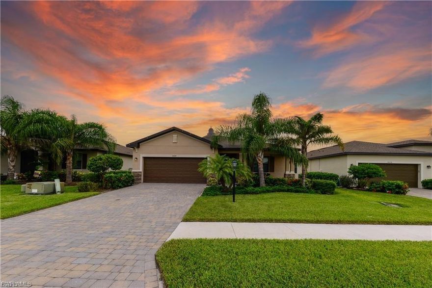 HUGE PRICE DROP!!!!! DEAL ALERT! VENICE MODEL OFFERING EXTENDED LANAI, MANY UPGRADES! LOCATED IN HIGHLY DESIRABLE PORTICO PHASE 1! Welcome to this charming community, nestled in the heart of Fort Myers. The open layout is ideal for family living. This residence is ideal for both relaxation and entertainment. Upon entry, the open floor plan seamlessly connects the living room to the kitchen, complete with stainless steel appliances, granite countertops, ample cabinet space, large island and a walk-in pantry. The primary suite is a private retreat, featuring two walk-in closets and an ensuite spa-like bathroom along with BRAND NEW LV FLOORING. The additional bedrooms offer versatility, perfect for guests or a growing family. Each space is thoughtfully designed with comfort and functionality in mind. Discover the expansive backyard, a serene escape perfect for enjoying Florida's beautiful weather year-round or hosting gatherings with friends and family. Portico is a newer development featuring a beautiful clubhouse, community pool, pickleball courts, a 24-hour fitness center, and tennis courts. Enjoy the community's sidewalks and bike paths for leisurely strolls and rides.