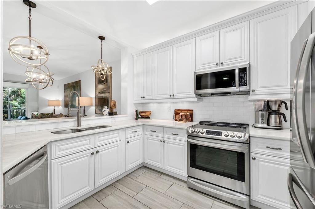 Photo of 7671 Pebble Creek CIR #105, NAPLES, FL 34108 (MLS # 226025728)