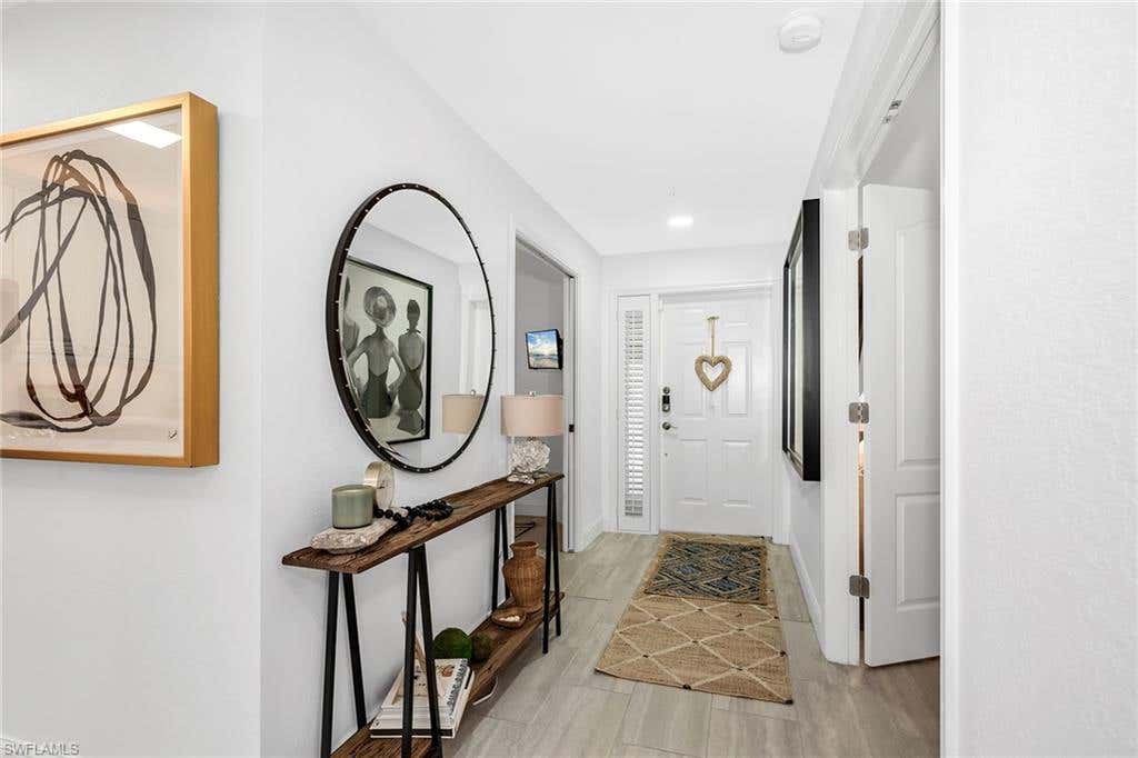 Photo of 7671 Pebble Creek CIR #105, NAPLES, FL 34108 (MLS # 226025728)