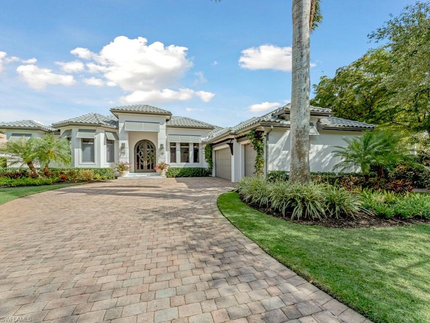 Located in the beautiful golf & country club community of Mediterra in Naples that offers a newly renovated private beach club, this totally updated estate exudes sophistication from the moment you step through the new rich carved hardwood front door into an ambiance of elegance. The heart of the home, a chef’s dream kitchen, features two expansive center islands, new premium cabinetry and appliances, including a SubZero refrigerator, a Wolf gas range, a wine cooler, a microwave drawer and a charming breakfast nook to the side. Flowing seamlessly from the kitchen, the formal living area is accentuated by a stunningly beautiful stone accent wall with a contemporary linear gas fireplace. In the family room the views are a bonus through the zero-corner sliding doors, inviting the outdoors in and leading to a breathtaking veranda with tasteful wood-planked ceiling. The formal dining room is adorned with custom-milled trim work and detailed tray and coffered ceilings, mirroring the home’s meticulous craftsmanship throughout. New designer light fixtures illuminate the exquisite wood and tile flooring that graces the living spaces. The primary suite, a private sanctuary with a sitting area, exclusive lanai access, two custom walk-in closets with built-ins and two en-suite baths that redefine indulgence, offering separate his-and-hers spaces with luxurious walk-in showers, a soaking tub, multiple shower heads, and a bidet. Designed for effortless indoor-outdoor living, the estate boasts impact windows and doors, a whole-home generator, and hurricane shutter screens for ultimate peace of mind. The outdoor oasis features a resort-style pool and spa with upgraded tile, a spacious covered lanai, a stone-accented fireplace with casual seating, and an outdoor kitchen and dining area—all set against a serene lake backdrop with new landscaping, including avocado trees. A three-car, air-conditioned garage, a comprehensive security system with cameras, linear A/C vents, and meticulously updated ceilings further elevate the home’s grandeur. Mediterra is a prestigious luxury golf & country club community featuring Two championship Tom-Fazio golf courses for avid golfers, a private beach club with restaurant & bar, multiple tennis courts, pickle-ball & bocce, fitness center, pristine bike & jogging trails, and luxurious dining at the private country club restaurant. The Mediterra Beach Club offers an escape to a 10,000 sq. ft two-story private oceanfront paradise on the Gulf of Mexico. Featuring a restaurant & bar that serves members via indoor & outdoor dining, this private facility boasts a heated swimming pool, a sundeck, and cabana beach service for chairs, umbrellas & refreshments.