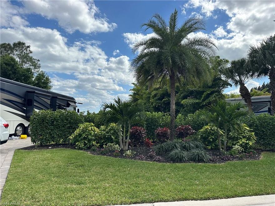 Luxury Lot, Lovely Landscaping, and Lakefront...SCORE!
This Gorgeous Lakefront motorcoach lot is waiting for you to call it your own. The landscaping is lovely, lush, and next level luxury. You will enjoy a full view of the lake and fountain offering peace and serenity day and night. If you have a stacker trailer painted to match your Class A or Super C motorcoach; you can park it right on your paver pad. You will find that option to be both convenient and cost effective. Golden Palms Luxury Motorcoach Resort will allow you access to activities and amenities for everyone including a heated pool, spa, sauna, exercise room, pickleball courts, a 1-acre dog park for your furry friends, & a 22-acre lake for catch and release fishing. You will be surrounded by nature but only a short drive to restaurants, shopping, golf courses, airports, & Gulf beaches. Take your tour of this stunning property today!!