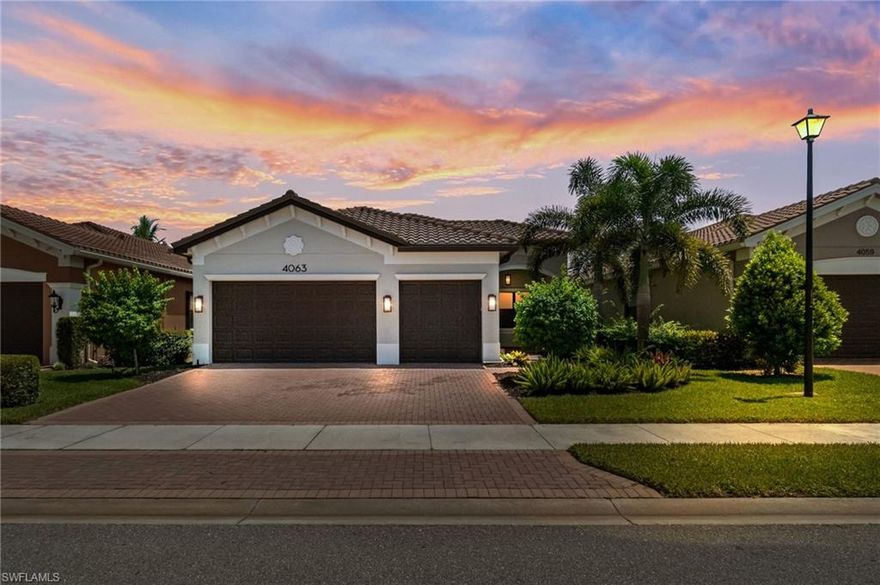 Located within the highly sought-after, natural gas community of Stonecreek and set within a top-rated school district, this elegant residence showcases the coveted Cabernet floorplan by GL Homes, offering 3 bedrooms, spacious den, and 3 full bathrooms. Designed for both style and comfort, the home features fresh interior paint, designer lighting, lush new palm landscaping, and tile flooring throughout the main living areas for a clean, cohesive look. The gourmet kitchen includes stainless steel appliances, quartz countertops, a breakfast bar for casual dining, and crown molding that carries into the main spaces for a refined finish. The spacious primary suite includes a generous sitting area, custom dual closets, and a spa-style ensuite bathroom with a walk-in shower, all overlooking peaceful lake views. Two private guest bedrooms are well-appointed, each with access to a full bathroom, offering comfort and space for family or visitors. A welcoming den provides a quiet escape for a home office, media lounge, or reading room—tailored to fit your lifestyle. Step outside to your own private lakeside retreat, where a custom in-ground pool and spa with travertine tile invite relaxation against a breathtaking waterfront backdrop. The expansive lanai is equipped with roll-down storm protection and offers panoramic views of the tranquil lake, perfect for enjoying morning coffee, sunset gatherings, or serene evenings under the stars. Additional features include negotiable furnishings, creating a turnkey opportunity to enjoy the ultimate Naples lifestyle. Stonecreek residents enjoy access to exceptional amenities, including a grand clubhouse, indoor sports complex, state-of-the-art fitness center, elegant social hall, resort-style pool, lap pool, whirlpool spa, firepit lounge, and a lakefront pier with pavilion. Active lifestyle offerings include five Har-Tru clay tennis courts, four pickleball courts, a full basketball court, beach volleyball, and a shaded playground—delivering the perfect blend of luxury, recreation, and community.