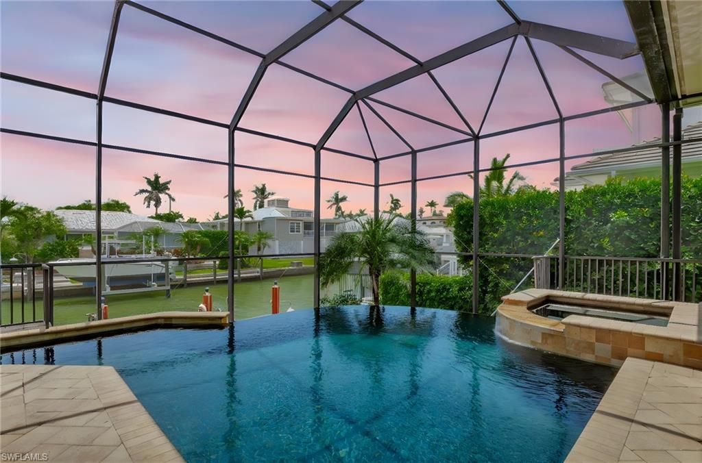 Photo of 1380 Marlin DR, NAPLES, FL 34102 (MLS # 225076267)