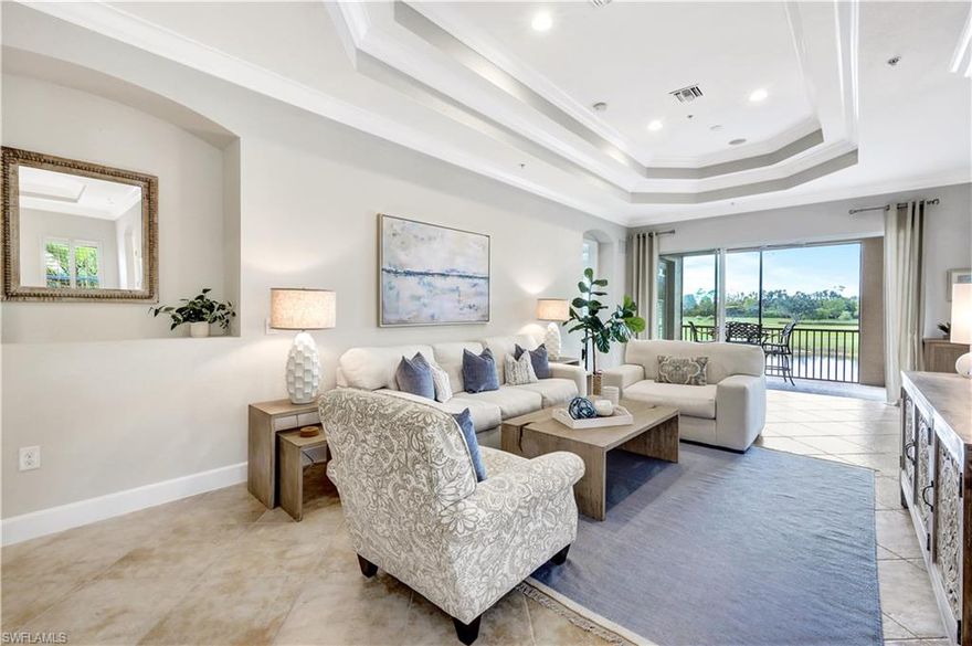 Indulge in unparalleled luxury living at The Quarry with this meticulously maintained second-floor Coach Home.  Boasting 3 Bedrooms + Den, 2 1/2 Baths, and a spacious 2-car attached garage, with breathtaking panoramic views of the lake and golf course. Inside, the upgraded kitchen features custom cabinetry, tile backsplash, granite countertops, and plantation shutters. Additional highlights include stylish chandeliers, surround sound speakers both inside and on the lanai, and a new AC system installed in 2022. As a resident of The Quarry, you'll have access to an exceptional range of world-class amenities. The newly renovated Beach Club serves as the heart of the community, featuring both indoor and outdoor dining options, a Tiki Bar, and a full-time Lifestyle Director. Enjoy relaxation by the Lap Pool or the Resort-Style Pool, complete with food and beverage service. Stay active with the state-of-the-art Fitness and Wellness Center, and explore a variety of sports, including Tennis, Pickleball, and Bocce.  With 500 acres of navigable lakes, The Quarry offers endless opportunities for boating, water skiing, paddle boarding, jet skiing, and fishing. All Beach Club amenities are included in the HOA dues, providing both convenience and exceptional value. Golf enthusiasts will appreciate the 18-hole championship golf course (membership optional). Don't miss your chance to live in one of Naples' most sought-after communities. Discover The Quarry today and elevate your lifestyle to new heights!