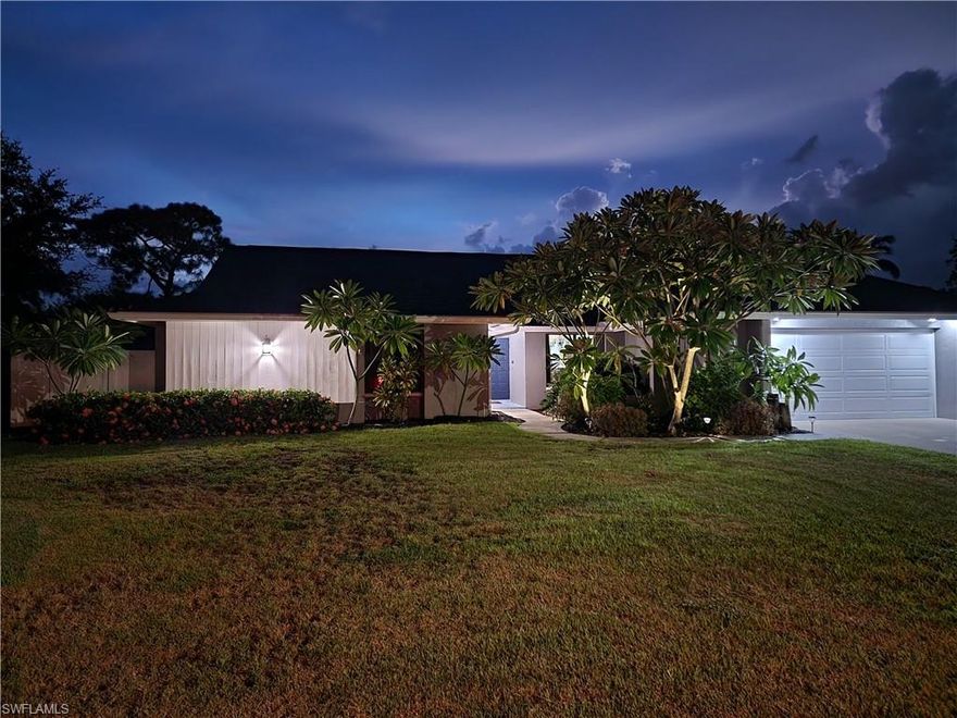 THIS HOME HAS IT ALL — A true 4-bedroom layout, stylish updates, tropical outdoor living, and a location in one of North Fort Myers’ best-kept secrets: a quiet, established neighborhood with NO HOA and NOT IN A FLOODZONE with quick access to downtown.. This is an area where people move in and stay for decades so UPDATED homes here rarely come available. Inside, the home is warm, fresh, and move-in ready. The kitchen shines with granite countertops, stainless appliances, a center island, and upgraded white cabinetry — even the fancy pantry units. There’s a sunny breakfast nook and a separate laundry room just off the kitchen. You’ll also find a formal living and dining room (great for entertaining or converting into a home office), plus a cozy family room anchored by a rustic brick fireplace. Brand-new French doors open from all the main living areas — and the primary suite — to the lanai, giving the whole home an airy, indoor-outdoor flow. Outside, it’s your own tropical retreat. The travertine pool deck (2024) wraps a sparkling pool, and the lighted gazebo adds a perfect touch for evenings under the stars. The vinyl privacy fence (redone in 2023) surrounds the backyard — ideal for kids and pets. Plus, there is an additional pool storage closet AND the pool equipment is all NEW, offering peace of mind and low-maintenance enjoyment. Need space for your boat, trailer, or RV? You’re covered. The extra-wide driveway easily handles it, and there’s a gate that opens to the side yard, so you can store your gear securely behind the fence. The spacious primary suite has a walk-in mirrored closet with built-in shelving, dual sinks, sleek black fixtures, and a built-in make up vanity. The additional three bedrooms are nicely sized and share a beautifully updated full bath with new hardware finishes. Here's a few bullet points: Roof (2023); New Pool Equipment; Dual Variable speed AC Systems for zoned comfort; IMPACT WINDOWS + HURRICANE SCREEN on Lanai (electric with manual override); Modern black hardware and matching faucets; Fresh interior paint; New LED lighting; newer woodlike tile flooring throughout. This is a true 4-bedroom home, not a converted den or flex space — offering plenty of room for a growing family, home office, hobby room, or multi-generational situation. Set in an under-the-radar neighborhood with mature trees, friendly neighbors, and no HOA oversight, this home delivers the freedom, space, and peace of mind you’ve been looking for. If you’ve been waiting for “the one,” this just might be it.