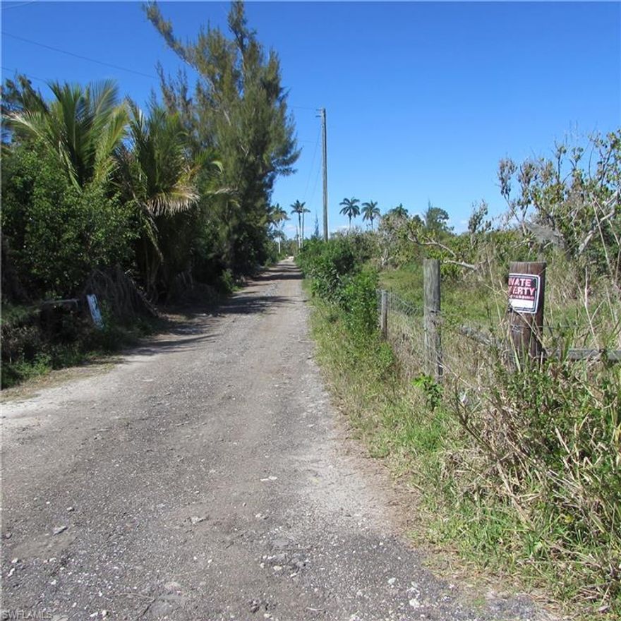 North end of PINE ISLAND in the Historic Area Of PINELAND, 18.699 acres, " 5-Plated Lots"...,  fenced on 2 sides, MANGO GROVE with Kitt & Kent Mangos. The Mango Trees were planted in  the middle 1980's. Pipe for well but not being used at this time. The grove needs a helping hand... A great location for HORSES and other animals, Electric and City water available. No wet lands, all high and dry. this property is located in the Pineland area, The Tarpon Lodge, Pineland Marina, Randell Research Center ( Caloosa Indian, Historic site ) And the Alden Pines Golf area is all around the corner. Hop in the Golf Cart and enjoy the views... Private, Pretty and peaceful... Check this out today !!